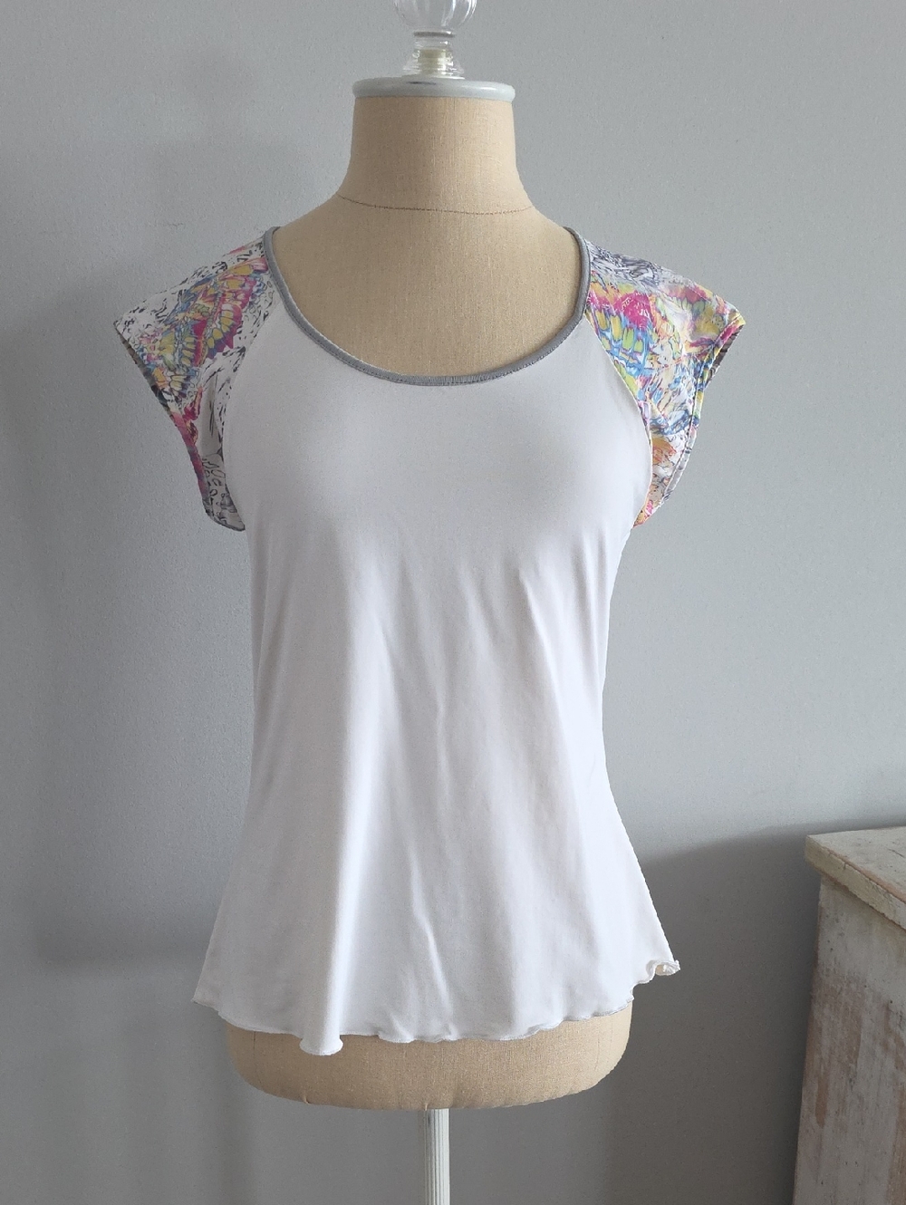 Denise Cronwall White Cap-Sleeve Women's Top with Multicolor Floral Accent